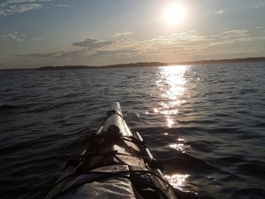 a sunset over a body of water