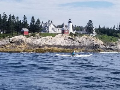 a group of people in a large body of water