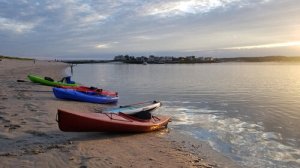 a small boat in a body of water