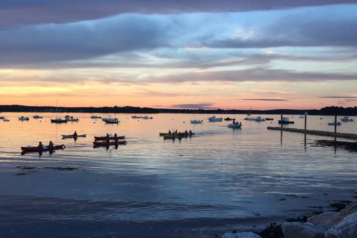 a sunset over a body of water