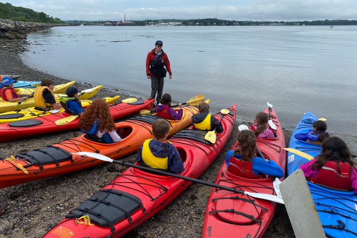 Kids kayaking on Casco Bay with Portland Paddle