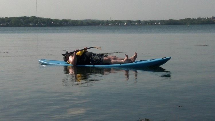 a small boat in a body of water