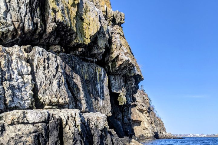 water next to the rock