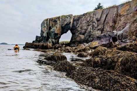 water next to the rock
