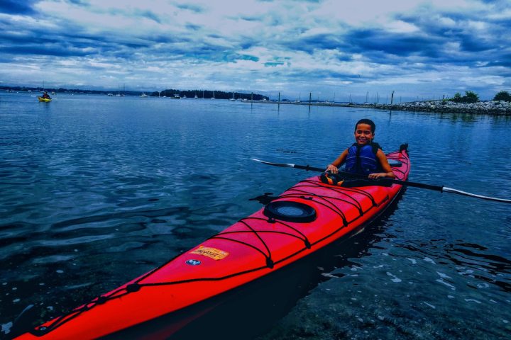 a small boat in a body of water
