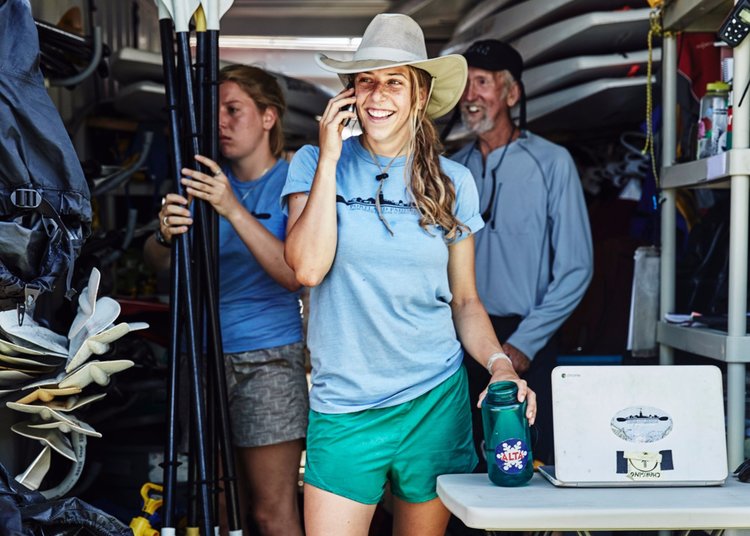 a man standing next to a woman