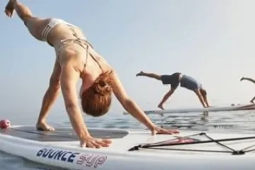 Posing on a stand-up paddleboard