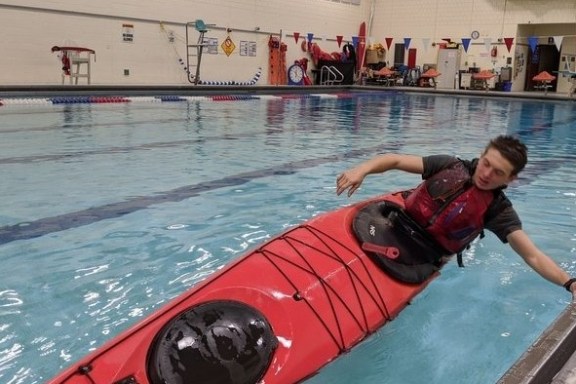 a person in a pool of water