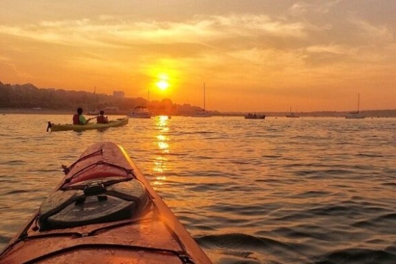a boat traveling across a large body of water