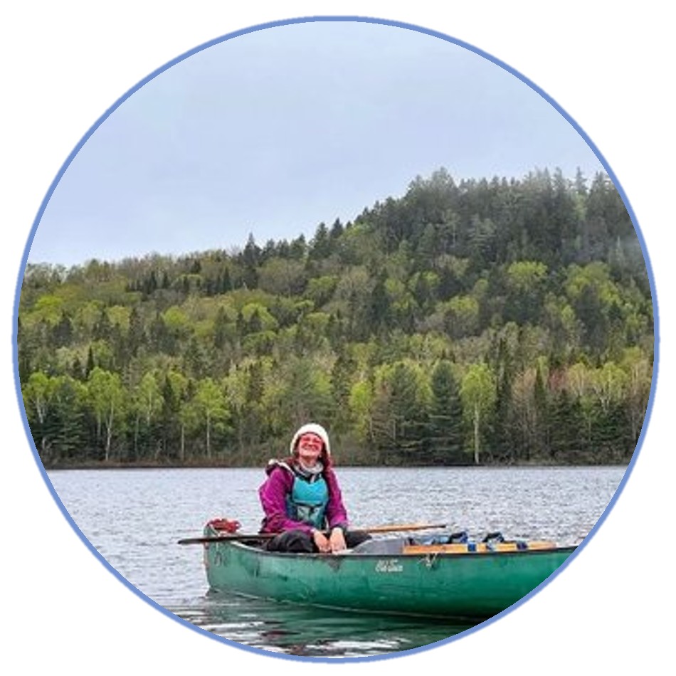 a man riding on the back of a boat in the water
