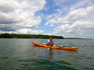 sea kayakers in calm seas
