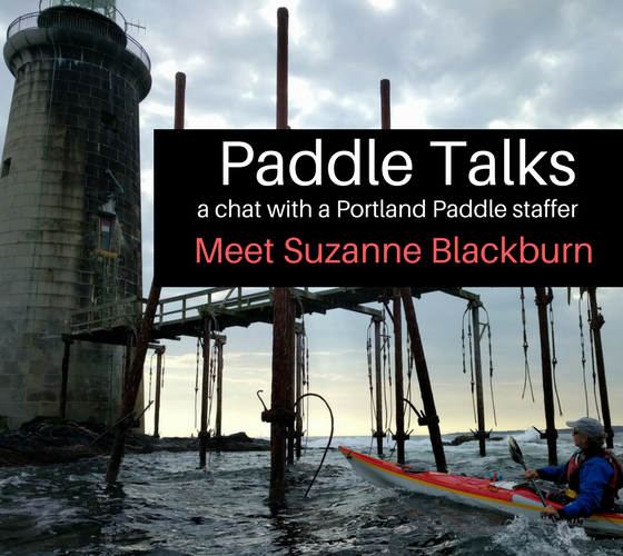 a sign in front of a building