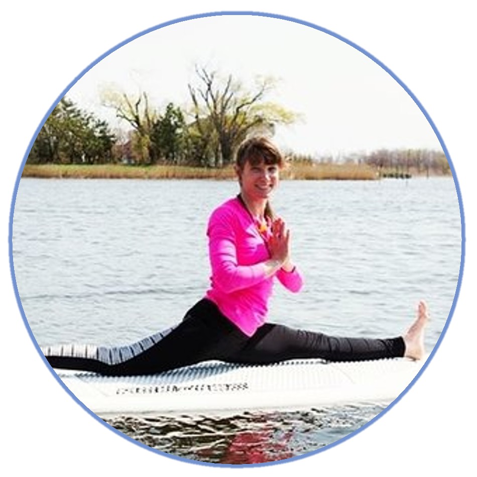 a person smiling next to a body of water
