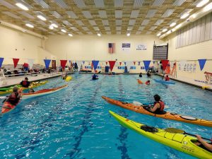 a group of people in a swimming pool