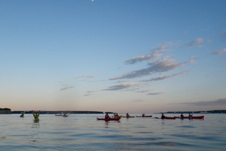 a small boat in a body of water