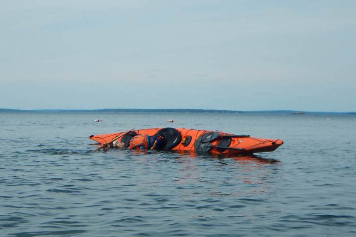 a small boat in a body of water