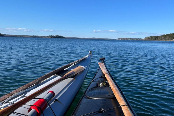 a row boat on a body of water