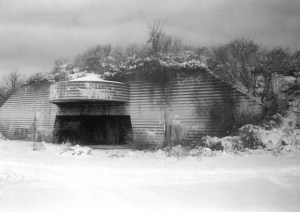 A historic 1940s photograph of a concrete military bunker